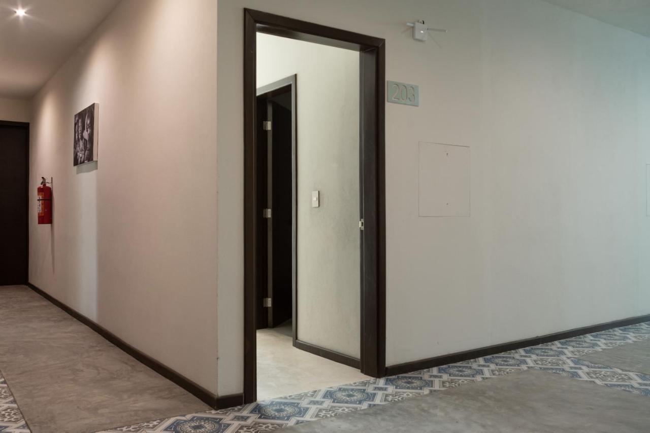 Hotel Mayari Holbox Екстер'єр фото A door opening