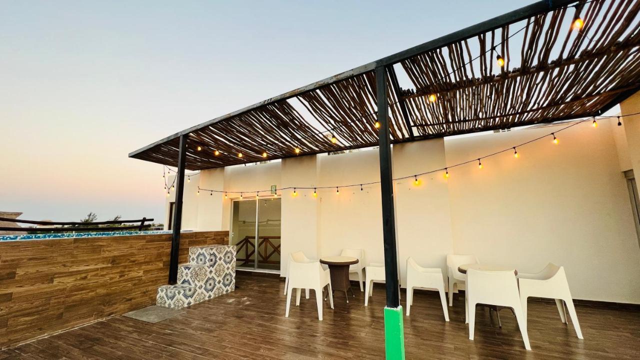 Hotel Mayari Holbox Екстер'єр фото Rooftop bar at the hotel